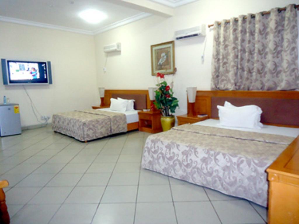 Sunset Hotel Kumasi Pokoj fotografie
